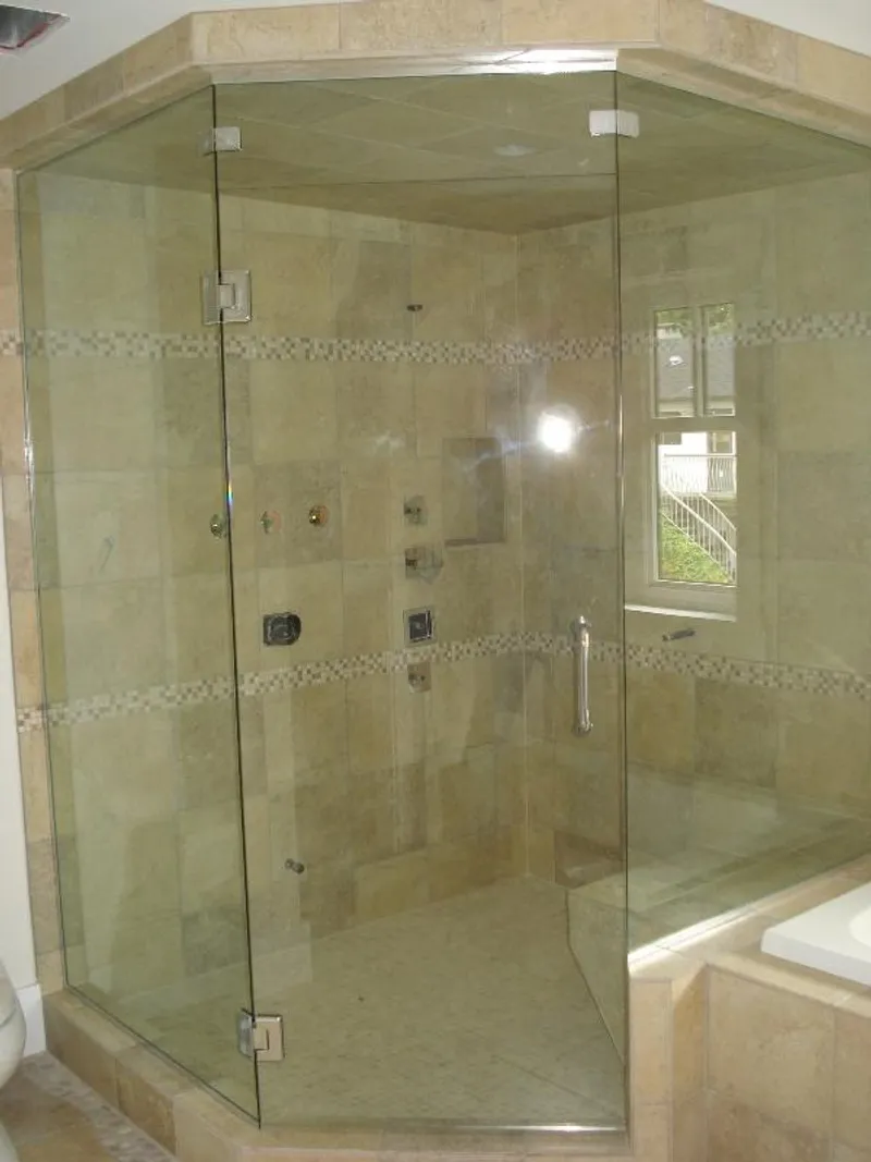 Frameless glass steam room enclosure in Lower Mainland home