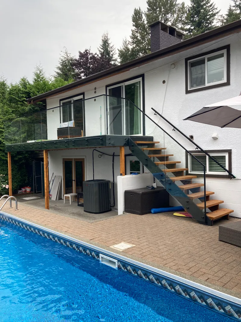 Outdoor deck glass railing with ocean view in Lower Mainland